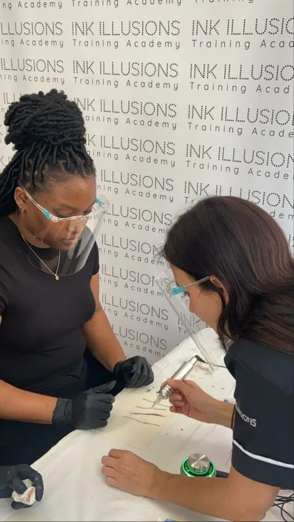 teaching a student how to tattoo stretch marks